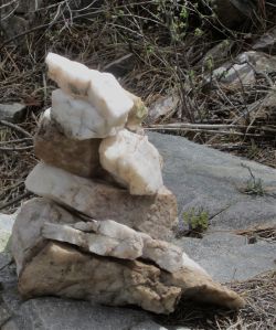 Marble cairn along side of ridge line trail