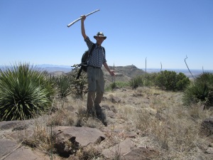 The author on North Las Uvas summit, with the radar dome of Magdelana Peak in the background.